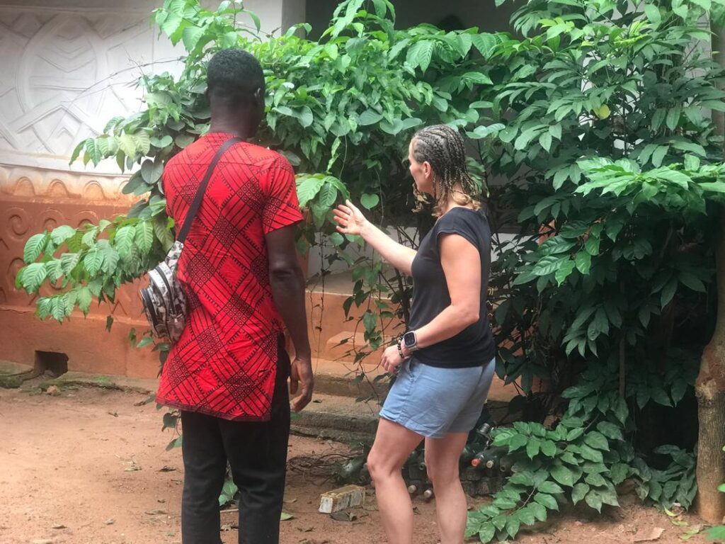 Guest during Ashanti tour visiting a shrine