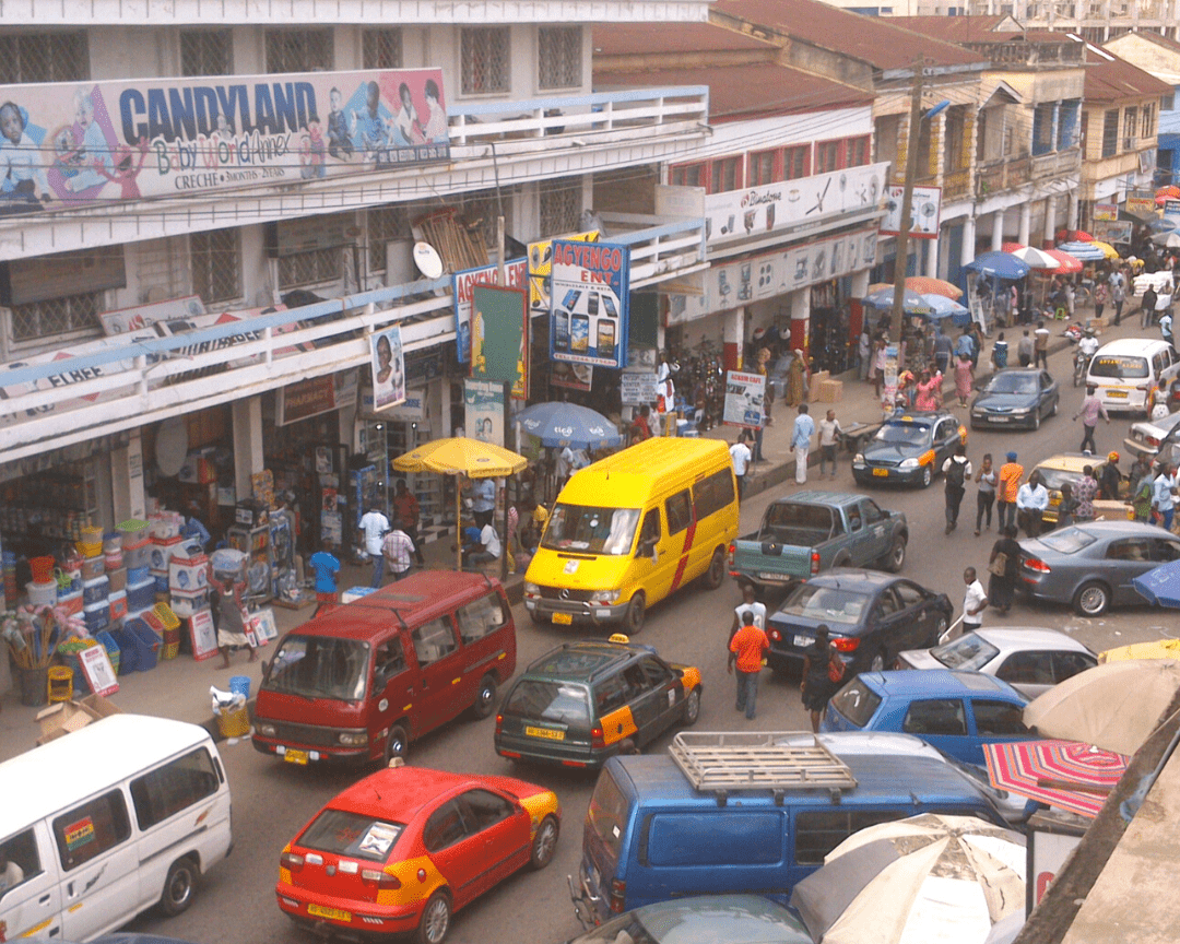 Busy road in Kumasi, travel by public transportation