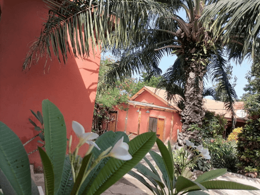 overview of the bar, terrace and dorm entrance at our guesthouse in Ghana