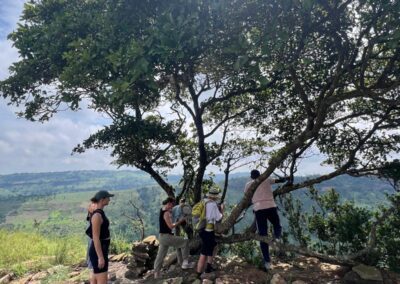nature weekend getaway in Ghana, guests visiting the mountain of Mercy and enjoying the view
